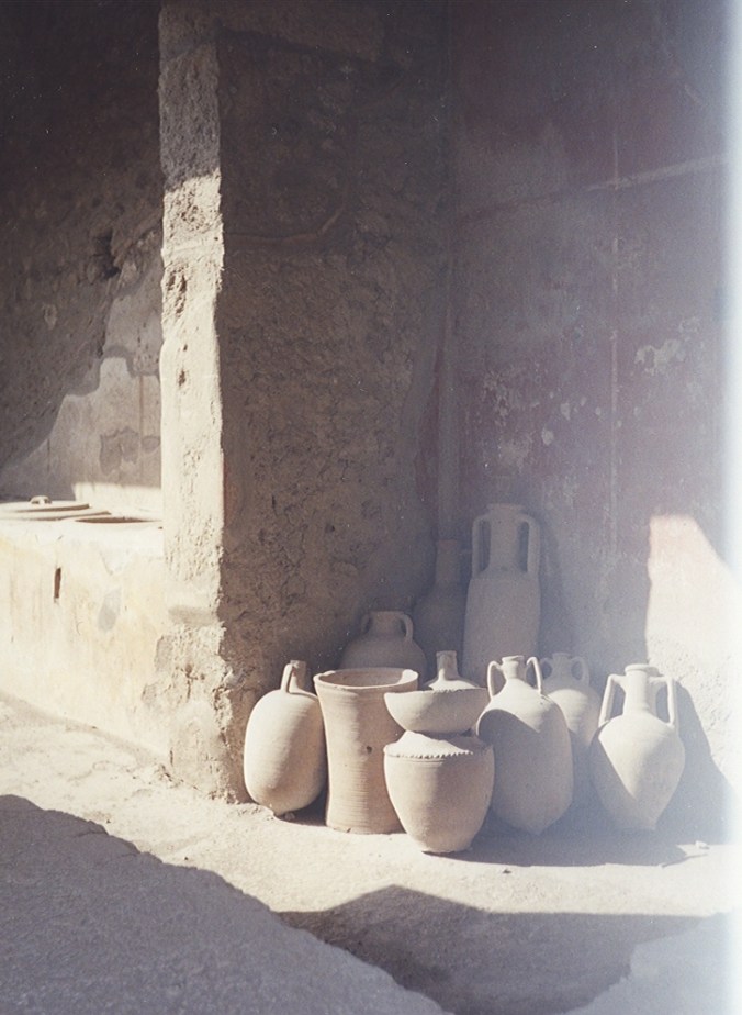 Maybe not a garden, but a photo of my other favorite -- clay pots.  These were in Pompeii -- amazing to think of the hands that created them, carried them, worked from them, were buried with them.