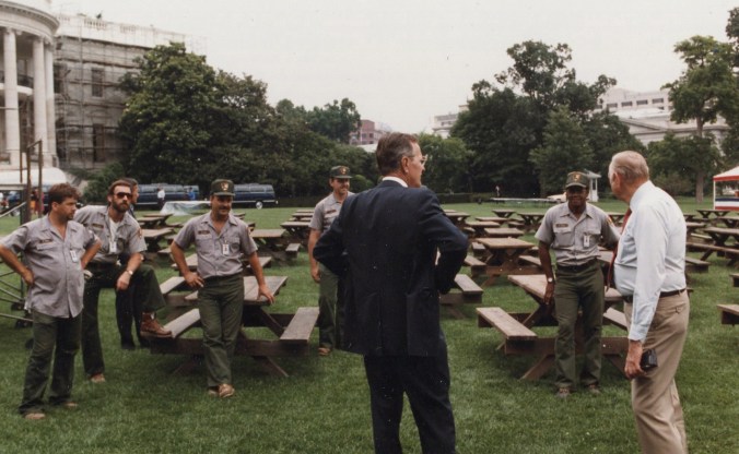 President Bush meets with "Master of the Grounds" Irv Williams (far right) and the White House grounds crew. Photo courtesy of Bush Presidential Library.